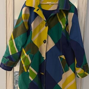 Bright geometric lined rain coat by Boden